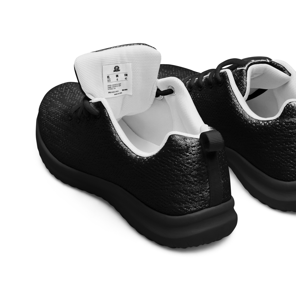 IX Lions Off-Field Trainers in black knit with cross logo on the tongue, heel view