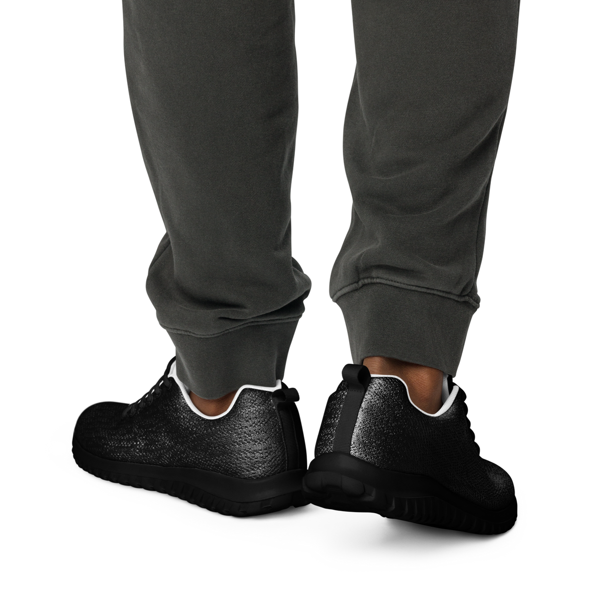 IX Lions Off-Field Trainers in black knit with cross logo on the tongue, heel view